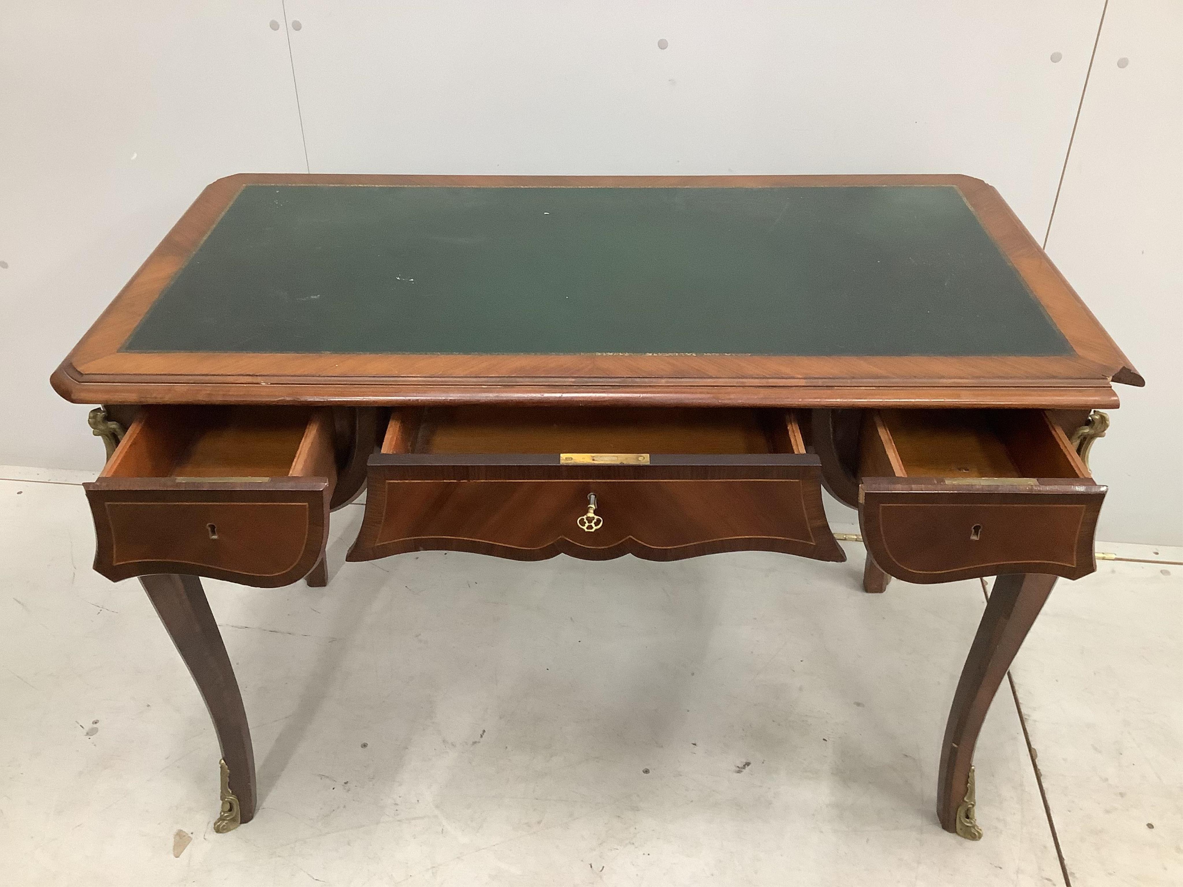 A French gilt metal mounted kingwood bureau plat, width 113cm, depth 60cm, height 77cm. Condition - fair, pieces of corner moulding are missing